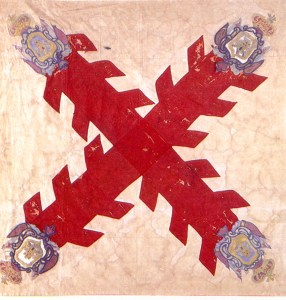 Pendón con el Aspa de Borgoña representando la Cruz de San Andrés, rematada con cuatro escudos, dos leones y dos castillos. Imagen tomada del Catálogo de la Colección de Banderas, Museo Nacional de Historia, INAH, México. Es el símbolo vexilológico más utilizado durante toda la época indiana (siglos XVI, XVII y XVIII).